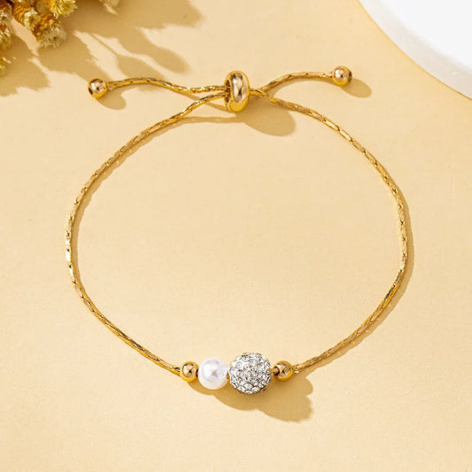 LUNESSIA minimalistinė auksinė reguliuojama apyrankė su perlo akcentu - Jaukuma