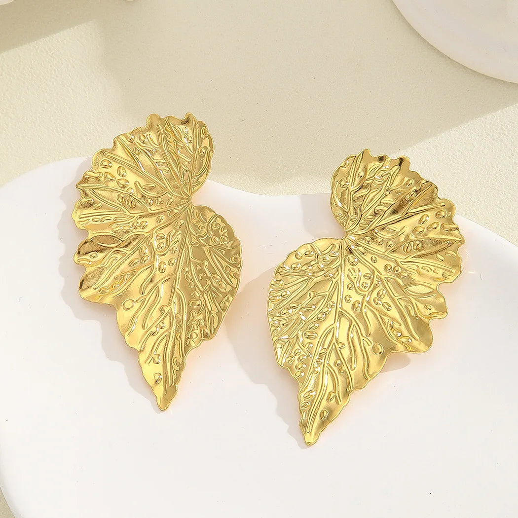 Minimalistiniai auksinės spalvos auskarai